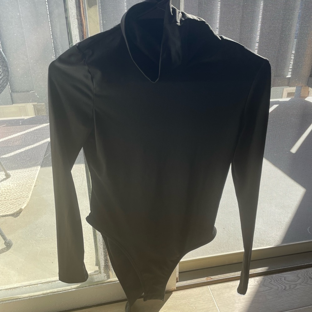 Black bodysuit with turtle neck